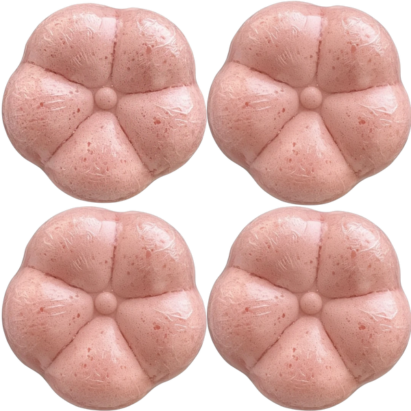 Four Potager Soap Co. flower-shaped pink bath bombs wrapped in clear film for a botanical spa experience.