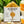 Potager Soap Co. Orange Dreamsicle soap bar with packaging surrounded by oranges and ylang ylang flowers